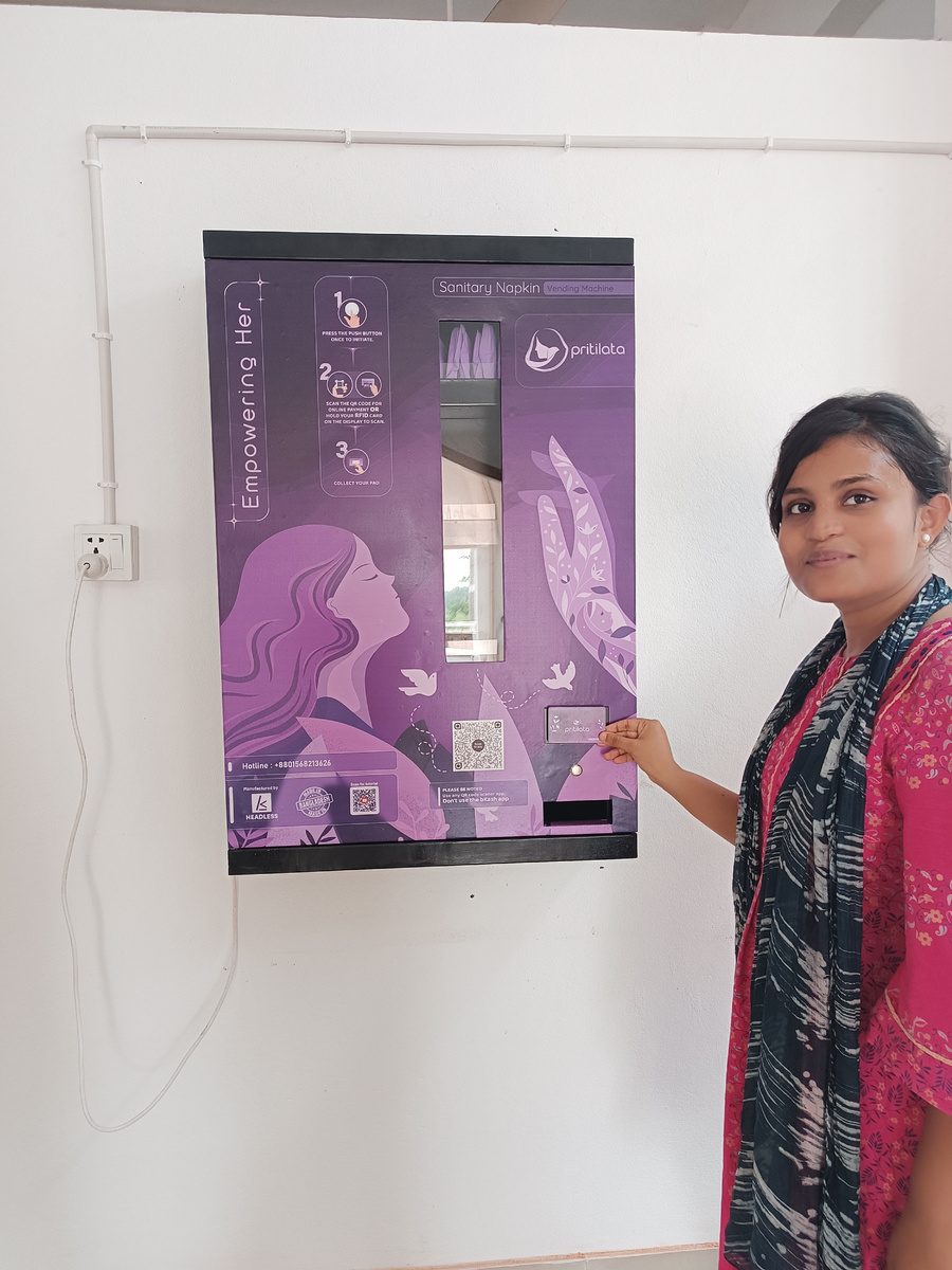 A student using the Pritilata vending machine at SUST